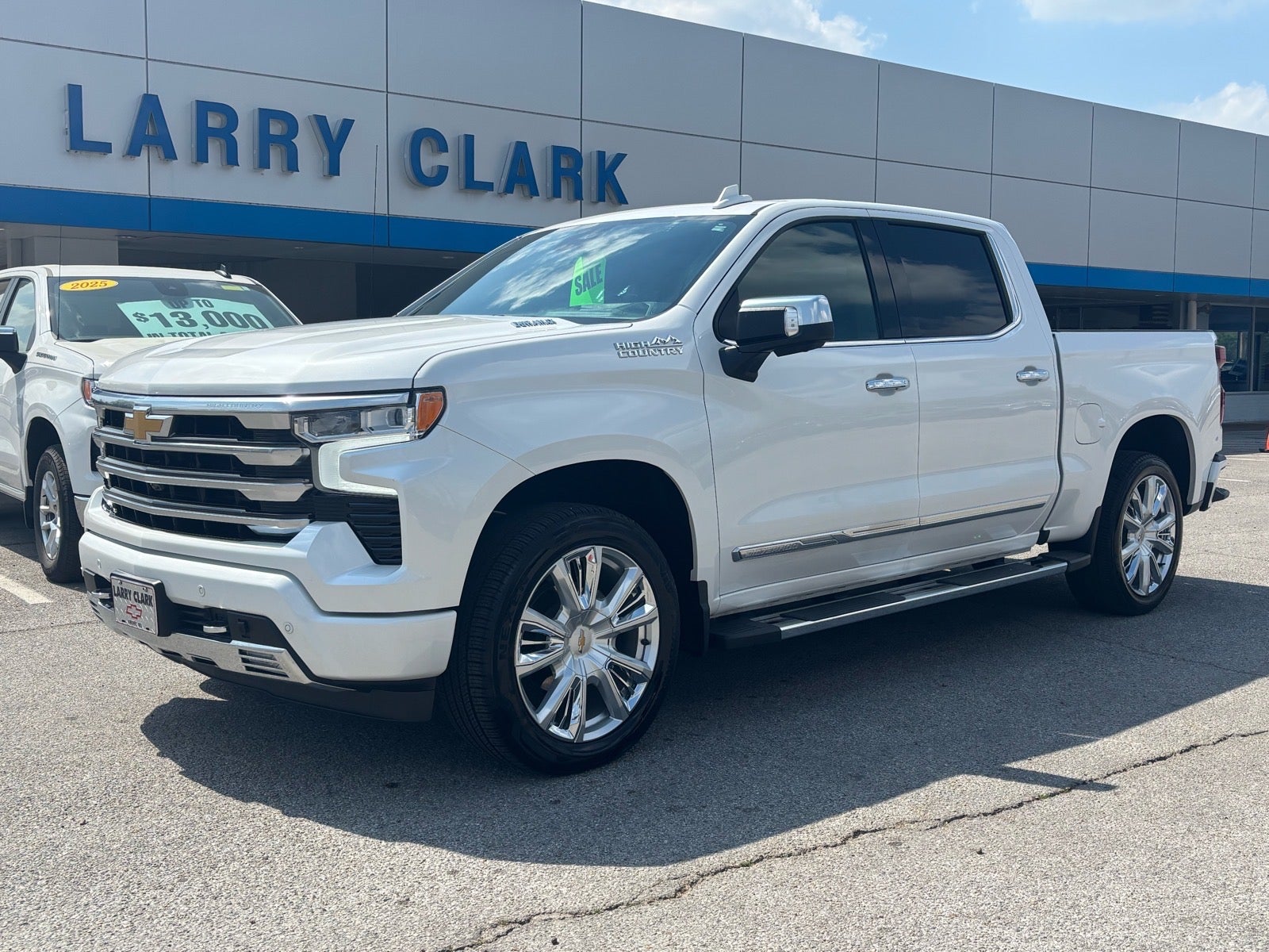 2023 Chevrolet Silverado 1500 High Country in Iridescent Pearl Tricoat — front three-quarter view