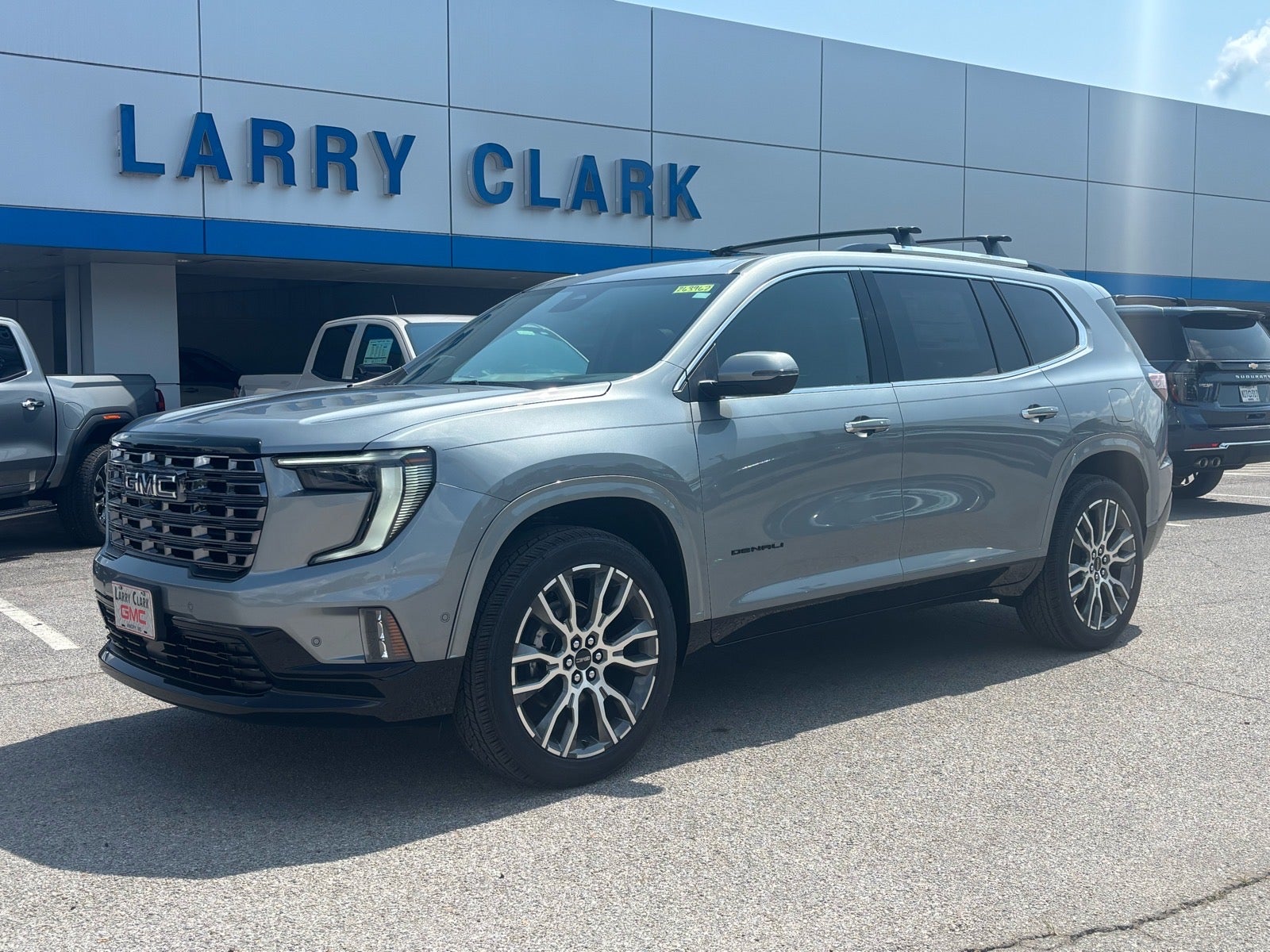 2026 GMC Acadia Denali Ultimate in Sterling Metallic — front three-quarter view