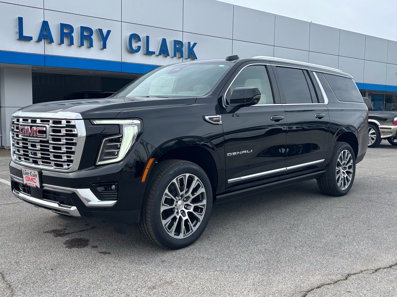 2026 GMC Yukon XL Denali in Onyx Black — front three-quarter view