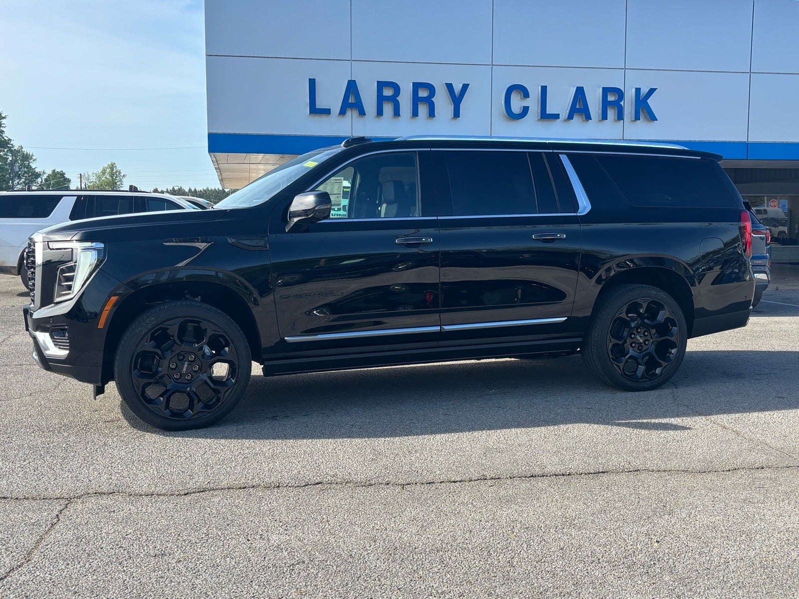 2026 GMC Yukon XL — rear three-quarter view