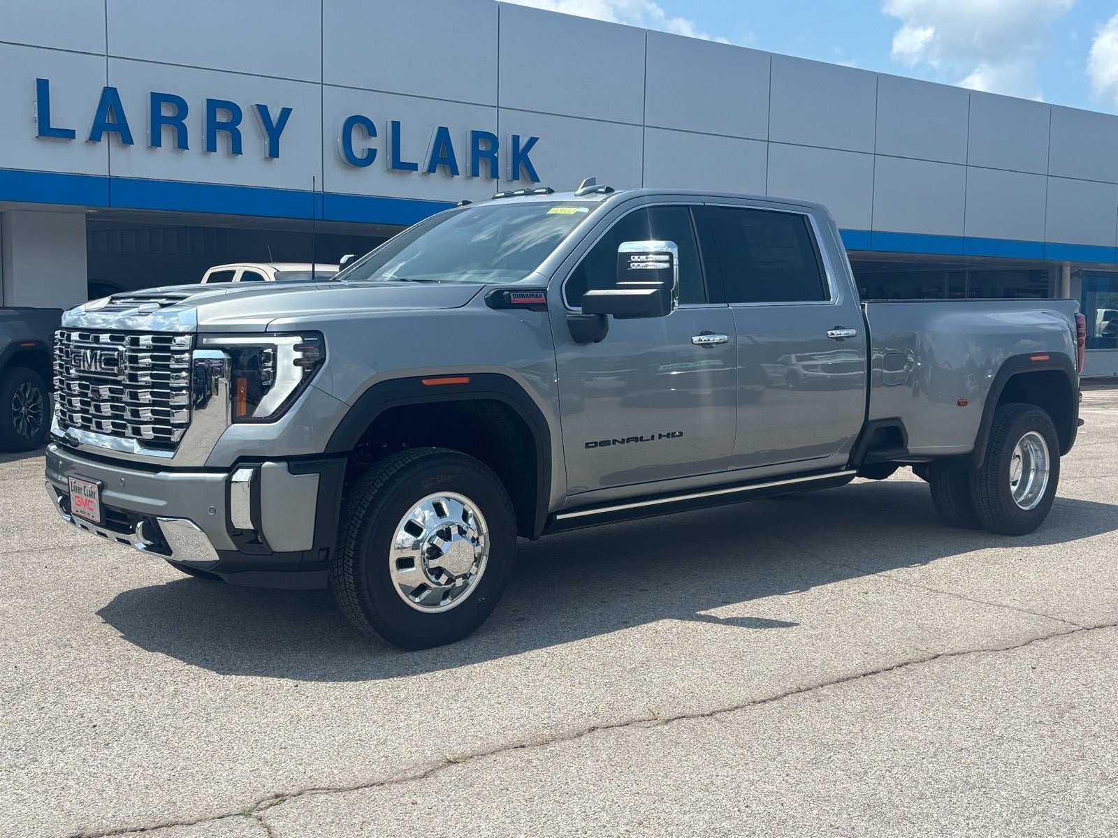 2026 GMC Sierra 3500 HD Denali DRW in Sterling Metallic — front three-quarter view