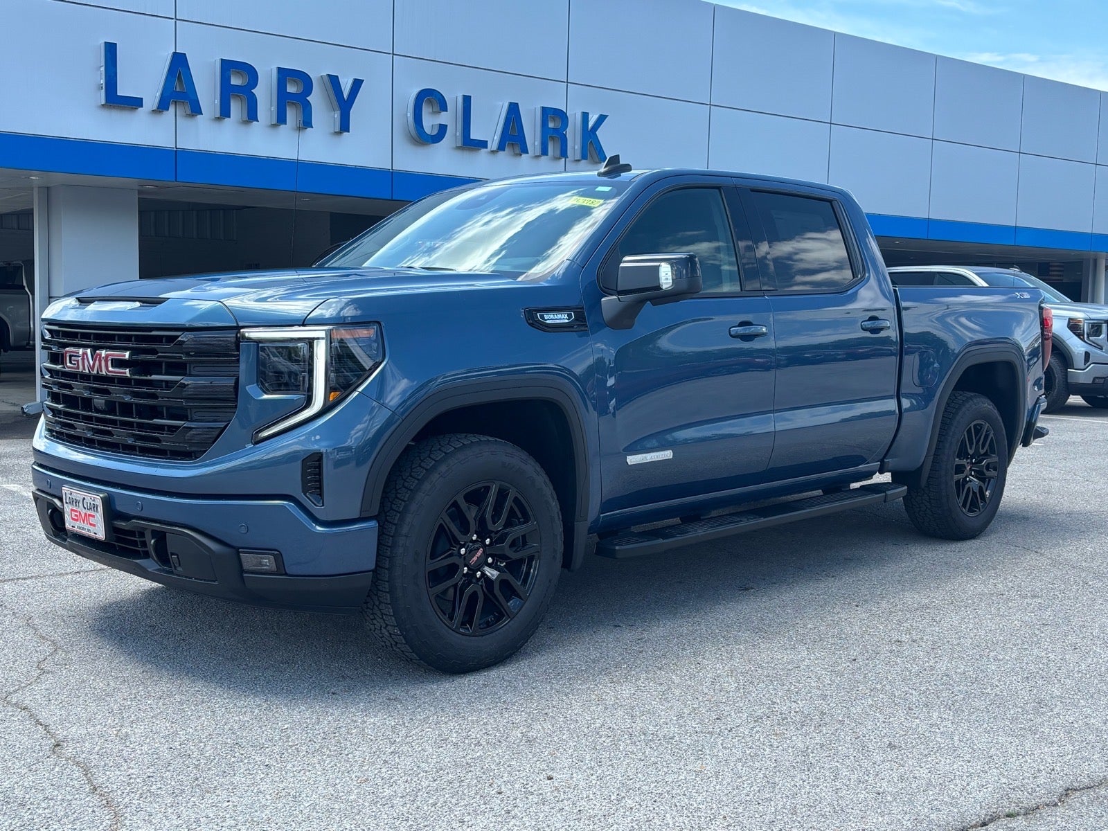 2026 GMC Sierra 1500 Elevation in Downpour Metallic — front three-quarter view