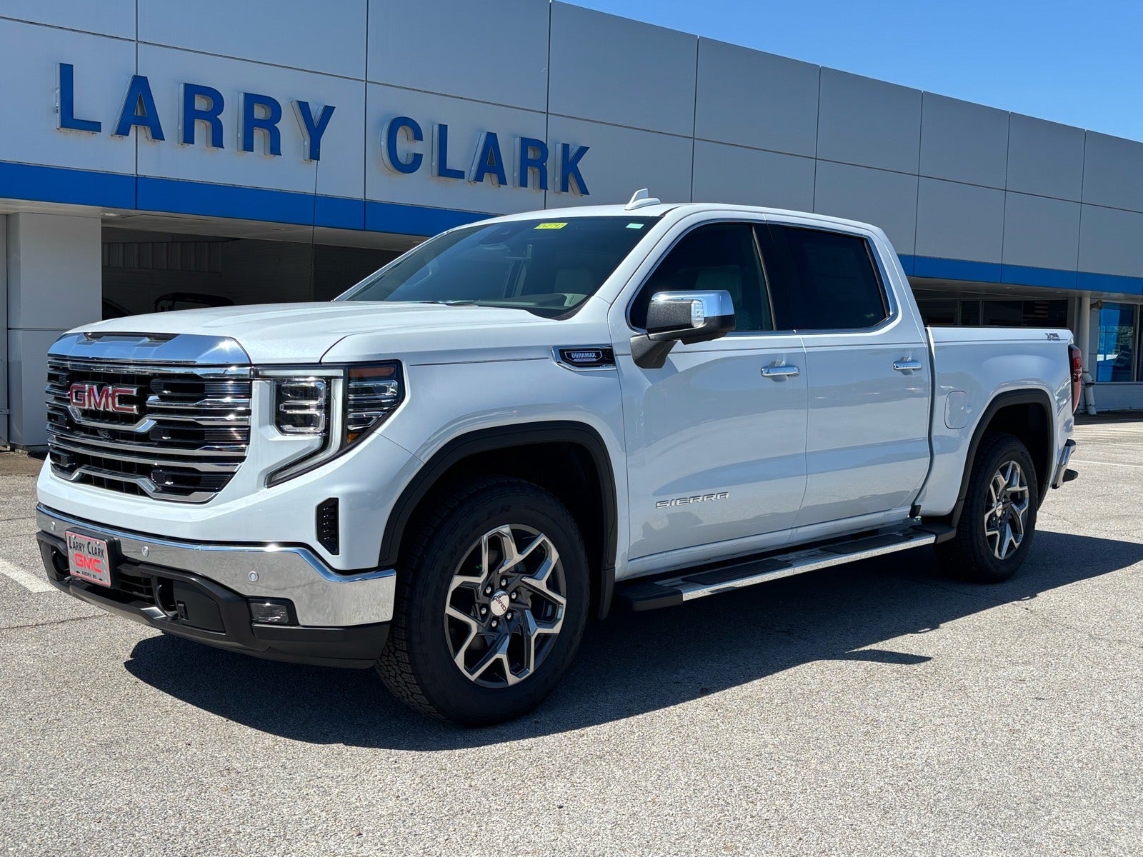 2026 GMC Sierra 1500 SLT in Glacier White Tricoat — front three-quarter view