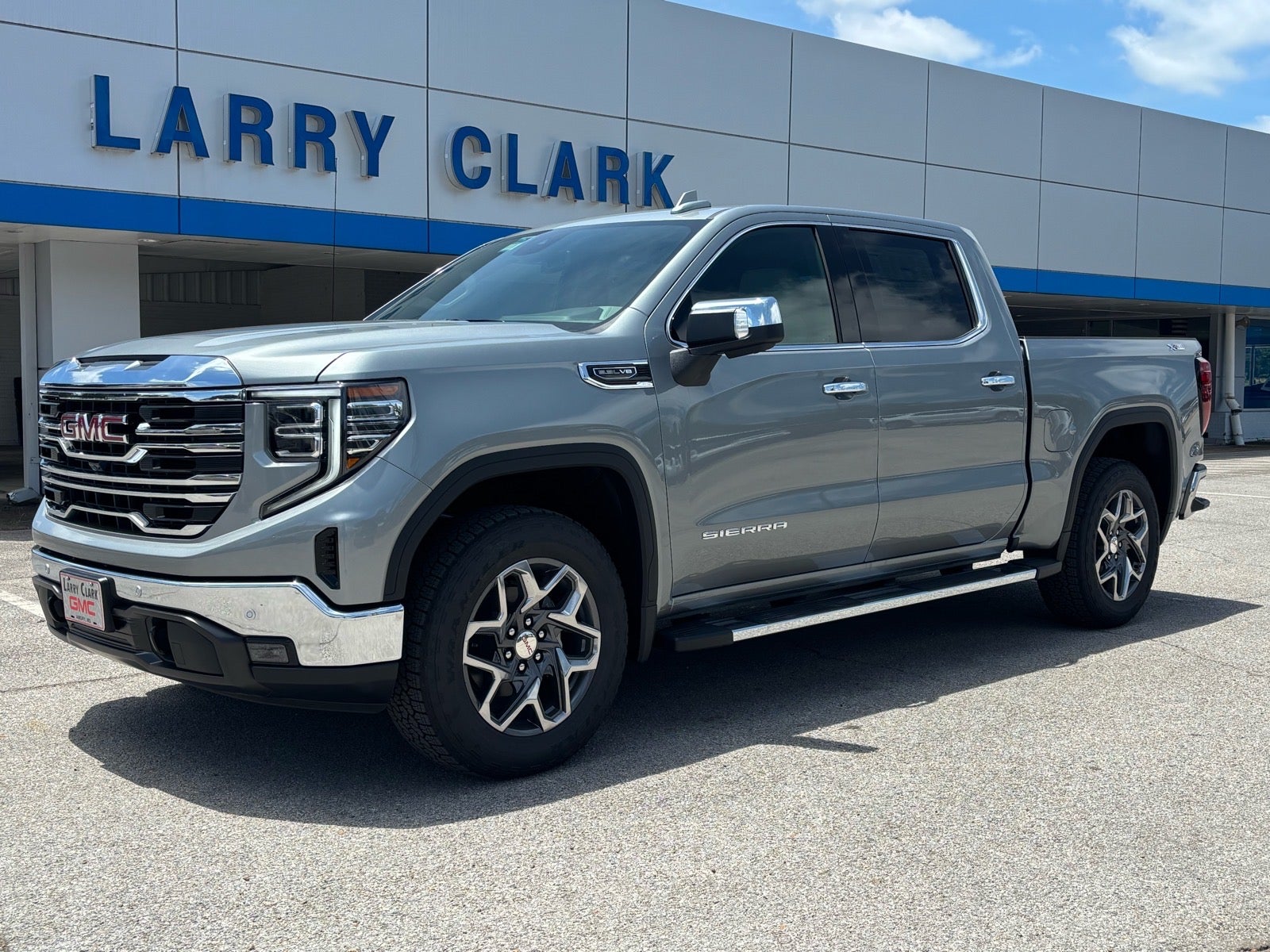 2026 GMC Sierra 1500 SLT in Sterling Metallic — front three-quarter view