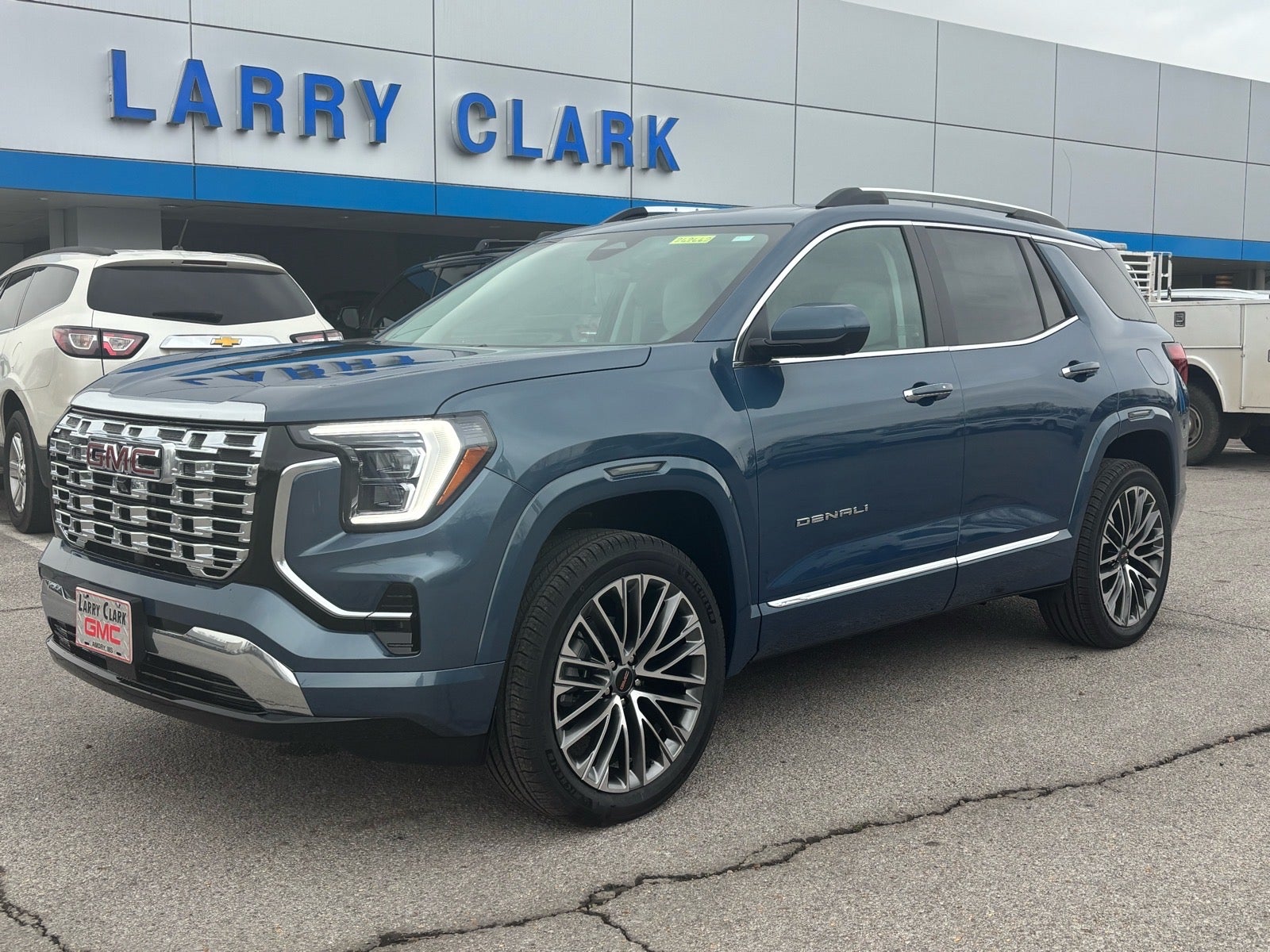 2026 GMC Terrain Denali in Downpour Metallic — front three-quarter view