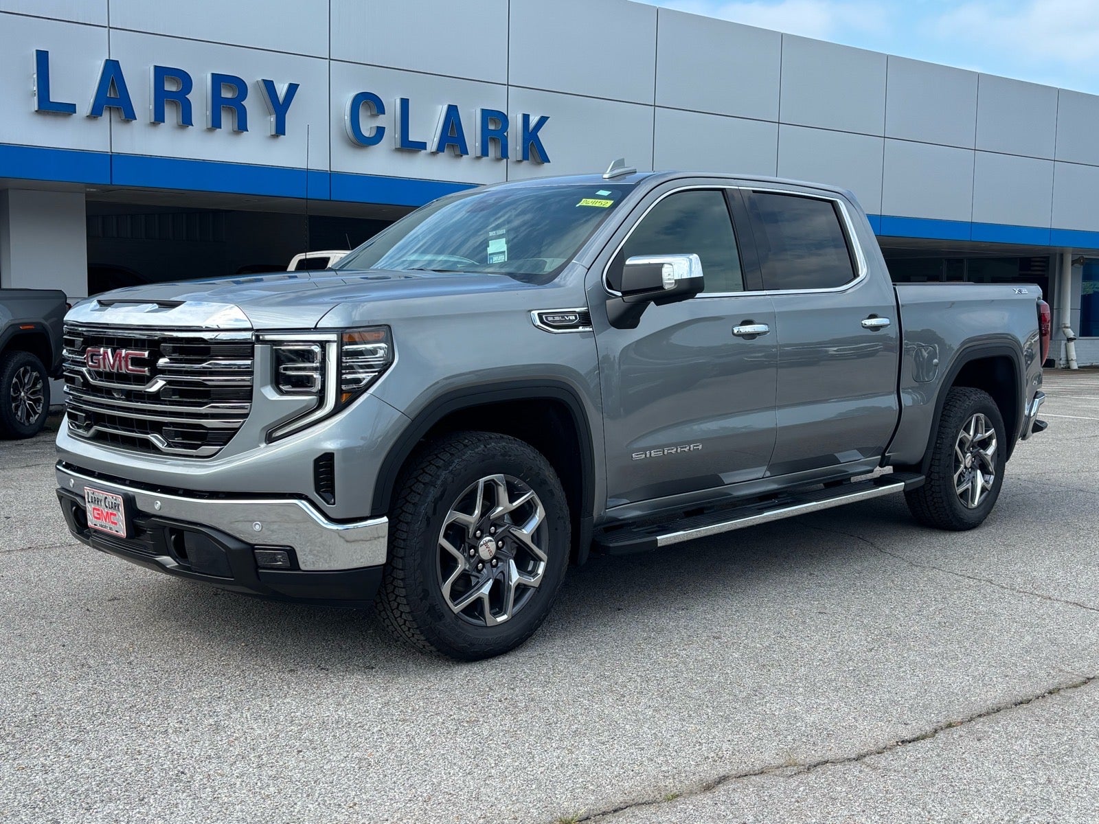 2026 GMC Sierra 1500 SLT in Sterling Metallic — front three-quarter view
