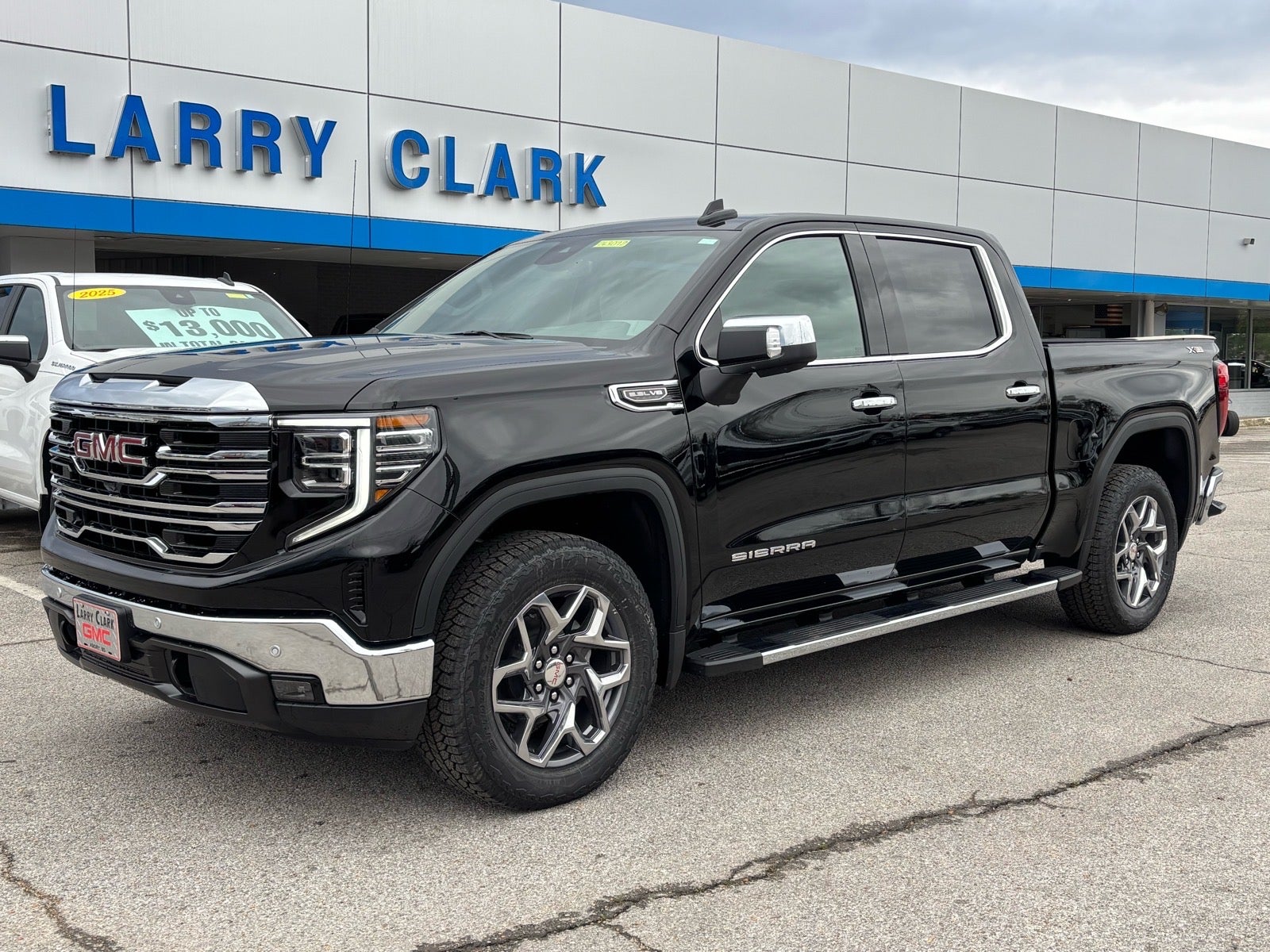 2026 GMC Sierra 1500 SLT in Onyx Black — front three-quarter view