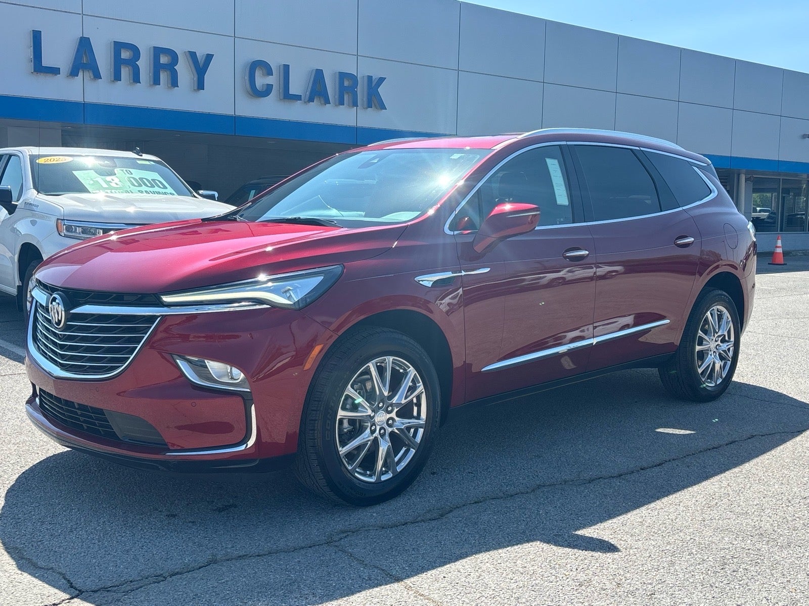 2022 Buick Enclave Essence in Cherry Red Tintcoat — front three-quarter view
