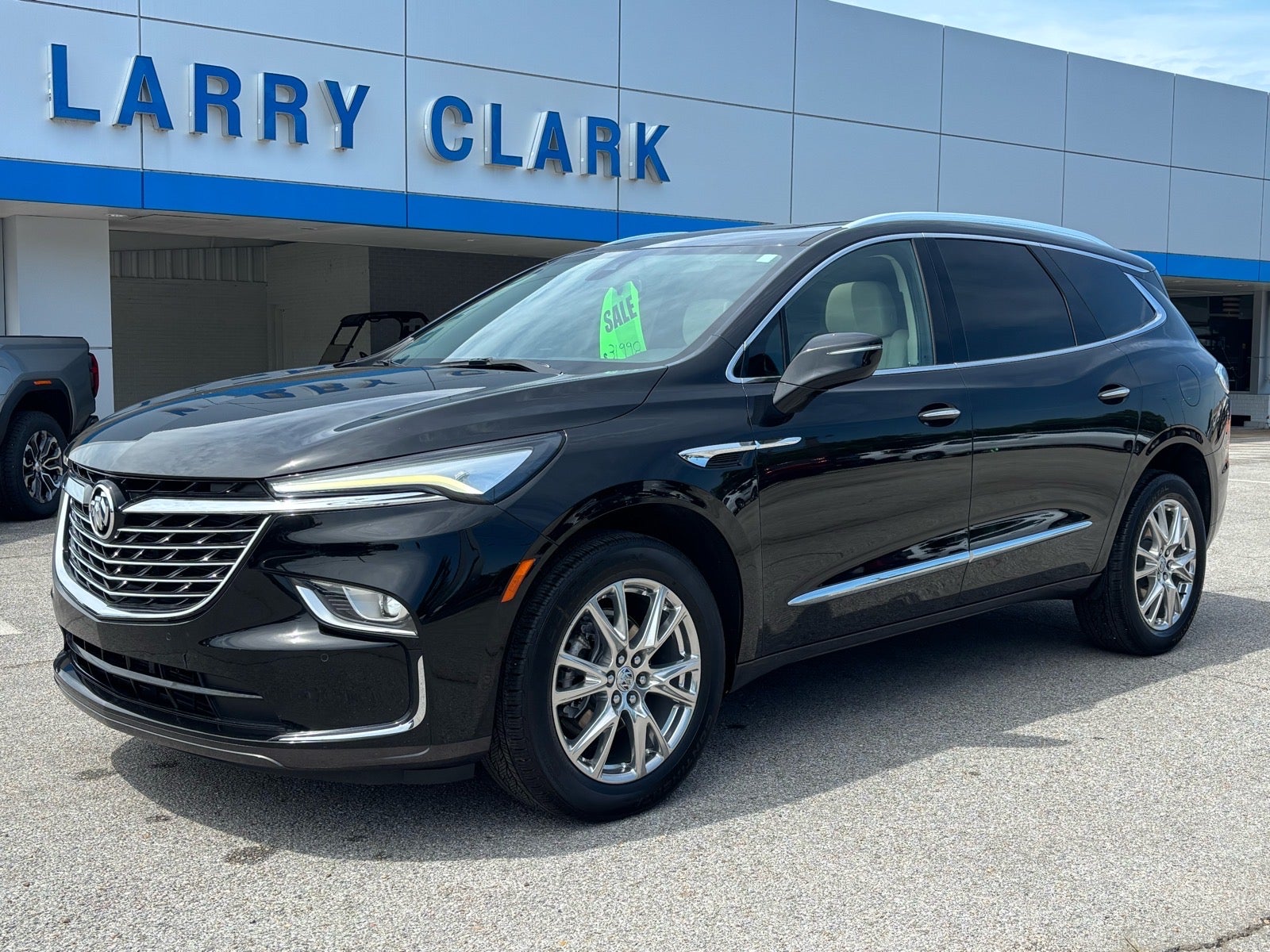 2023 Buick Enclave Essence in Ebony Twilight Metallic — front three-quarter view