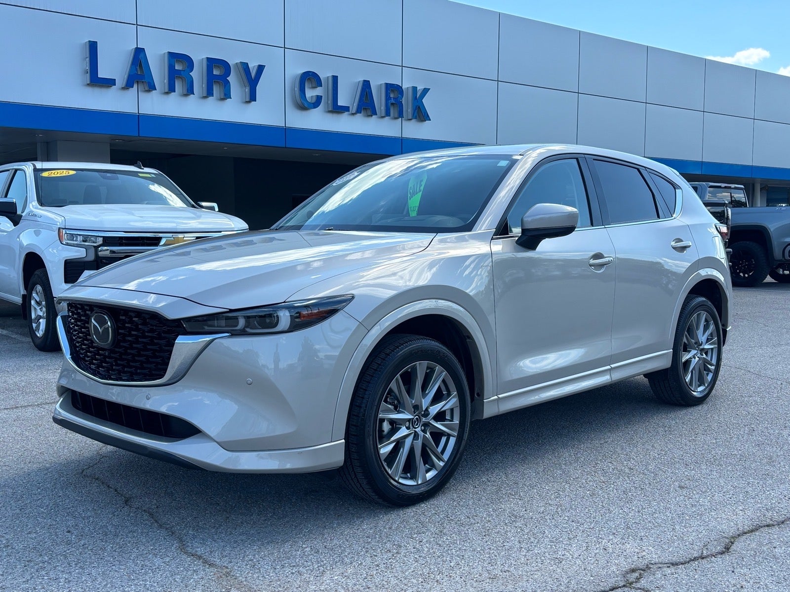 2025 Mazda Mazda CX-5 2.5 S Premium Plus in Tan — front three-quarter view